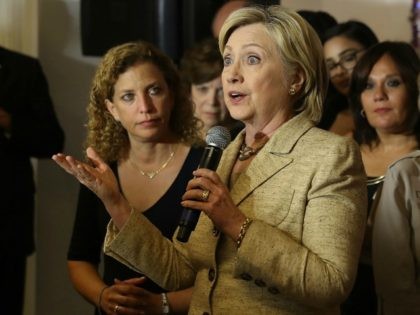 Rep. Debbie Wasserman Schultz (D-FL) looks on as Democratic presidential nominee Hillary C