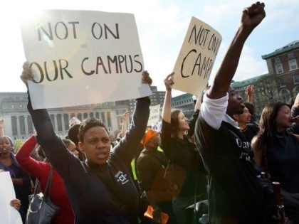 Protesters rally at Teachers College at Columbia University October 10, 2007, in New York