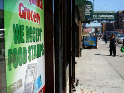 NEW YORK, NY - SEPTEMBER 19: A grocery store advertises that they accept food stamps in th