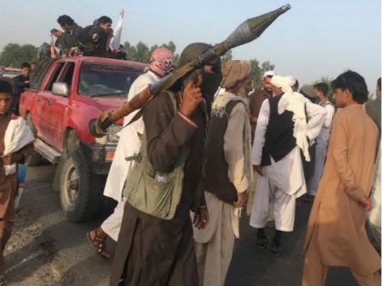 Taliban fighters gather in Surkhroad district of Nangarhar province, east of Kabul, Afghan