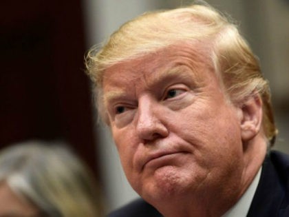 President Donald Trump listens during a meeting with Hispanic pastors in the Roosevelt Roo
