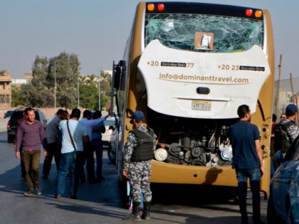 A picture taken on May 19, 2019, shows a bus damaged during a bomb blast near Egypt's fame