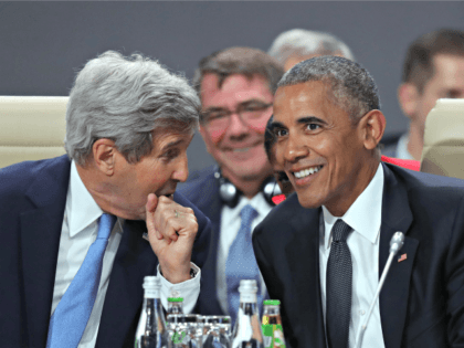WARSAW, POLAND - JULY 08: U.S. President Barack Obama (R) and Secretary of State John Kerr