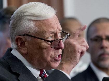 House Majority Leader Steny Hoyer of Md., left, accompanied by Rep. Anthony Brown, D-Md.,