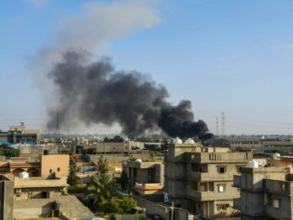This picture taken on June 29, 2019 shows smoke plumes rising in Tajoura, south of the Lib