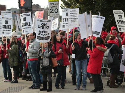 CHICAGO, ILLINOIS - OCTOBER 17: Chicago public school teachers and their supporters picket