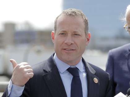 U.S. Rep. Josh Gottheimer (NJ-5), left, and and Rep. Bill Pascrell (NJ-9) stand at a podiu
