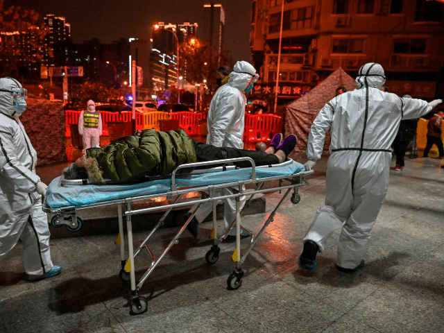 Medical staff members wearing protective clothing to help stop the spread of a deadly viru