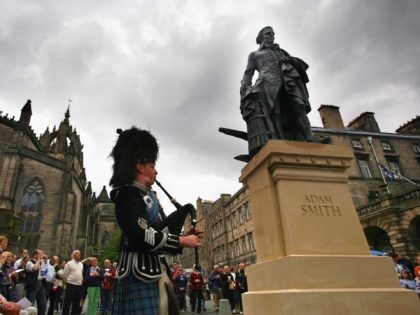 EDINBURGH, SCOTLAND - JULY 04: A crowd gather to watch the unveiling of a 10ft bronze stat