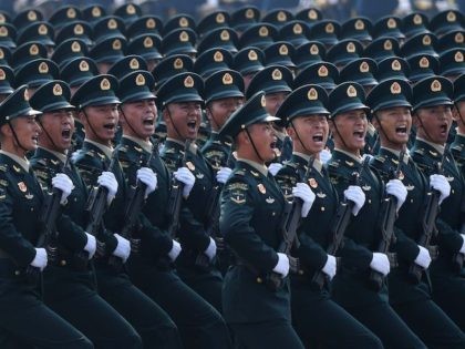 Chinese troops march during a military parade in Tiananmen Square in Beijing on October 1,