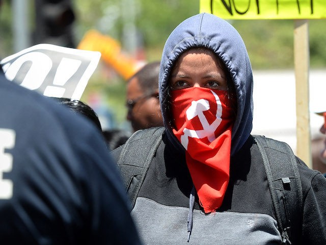 LOS ANGELES, CA - MAY 01: Anti-Trump protesters are kept away from pro-Trump protestors at