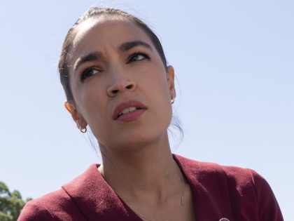 Rep. Alexandria Ocasio-Cortez, D-N.Y., speaks with reporters, Thursday, June 17, 2021, as