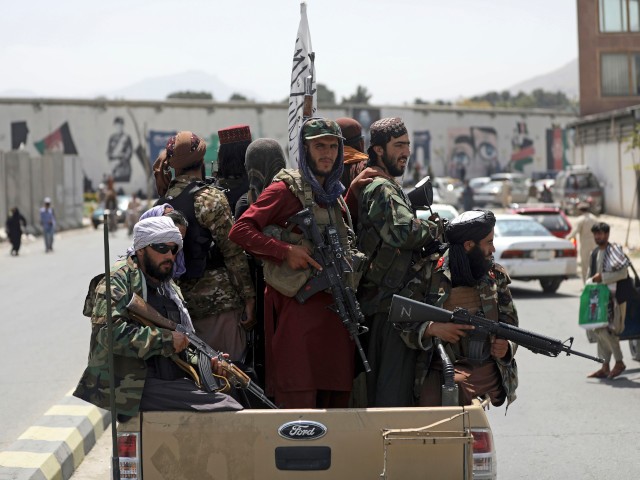 Taliban fighters patrol in Kabul, Afghanistan, Thursday, Aug. 19, 2021. The Taliban celebrated Afghanistan's Independence Day on Thursday by declaring they beat the United States, but challenges to their rule ranging from running a country severely short on cash and bureaucrats to potentially facing an armed opposition began to emerge. (AP Photo/Rahmat Gul)