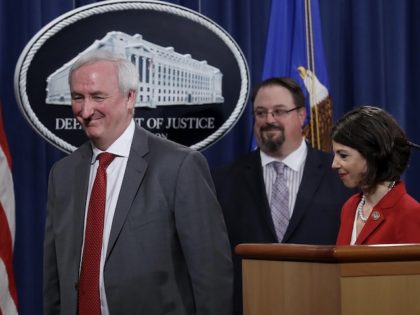 WASHINGTON, DC - JULY 19: Deputy Attorney General Jeffrey Rosen (2nd L) departs a press co