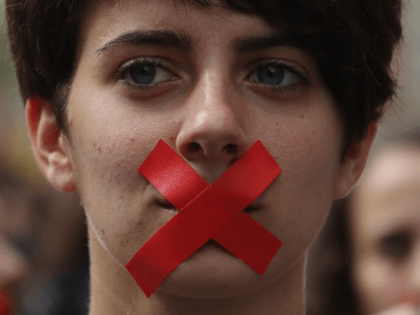 BARCELONA, SPAIN - OCTOBER 02: Students hold a silent protest against the violence that ma