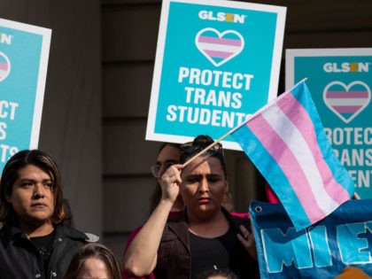 NEW YORK, NY - OCTOBER 24: L.G.B.T. activists and their supporters rally in support of tra