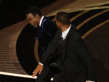 HOLLYWOOD, CALIFORNIA - MARCH 27: Will Smith appears to slap Chris Rock onstage during the