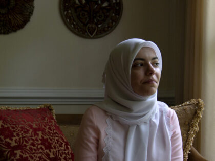 FAIRFAX, VA - JUNE 1: Abrar Omeish poses for a portrait in her home in Fairfax, VA on June