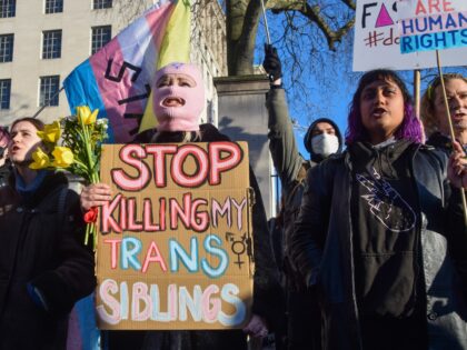 LONDON, UNITED KINGDOM - 2023/01/21: A protester holds a placard which states 'Stop killin