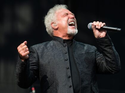 CHELMSFORD, ENGLAND - AUGUST 19: Tom Jones performs on the Virgin Media Stage on day 2 of