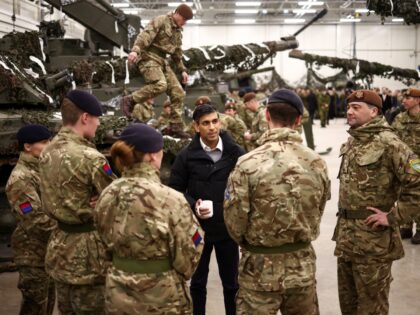 TAPA, ESTONIA - DECEMBER 19: British Prime Minister Rishi Sunak talks with NATO Troops at