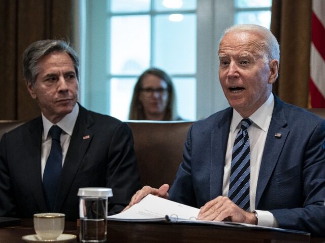 U.S. President Joe Biden speaks while Antony Blinken, U.S. secretary of state, left, liste