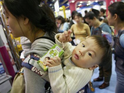 EOUL, SOUTH KOREA - FEBRUARY 17: A mothers carry her baby at a Pregnancy and Maternity exh