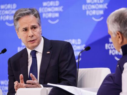 17 January 2024, Switzerland, Davos: US Secretary of State Antony Blinken (l) speaks at an
