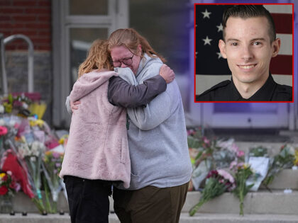 Leah Fauth gets emotional after leaving flowers in front of the West York Police Departmen