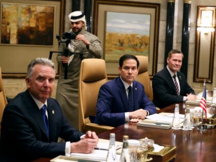 U.S. Secretary of State Marco Rubio, center, sits next to U.S. National Security Advisor M
