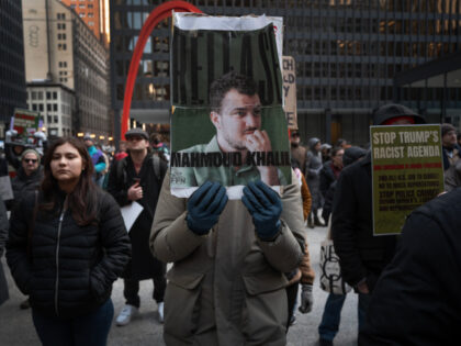 Activists hold a rally and march through downtown to show support for Mahmoud Khalil on Ma