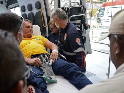 Former Brazilian president Jair Bolsonaro arrives by ambulance at the Rio Grande Hospital