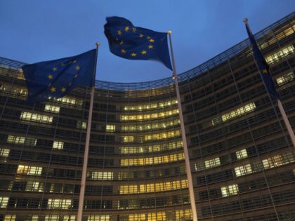 BRUSSELS, BELGIUM - OCTOBER 16: Flags of the European Union fly outside the Berlaymont bui