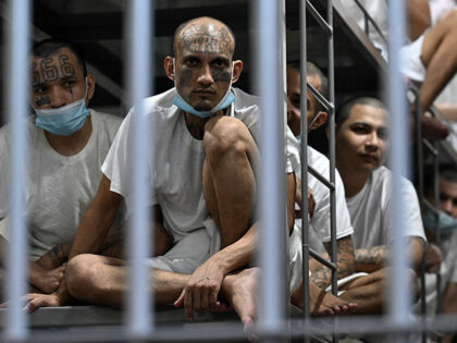 Inmates remain in their cell as Costa Rica's Minister of Security Gerald Campos tours the