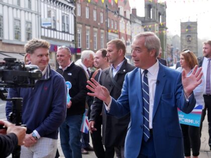 Reform UK leader Nigel Farage on a walkabout in Morpeth, Northumberland, whilst on the loc