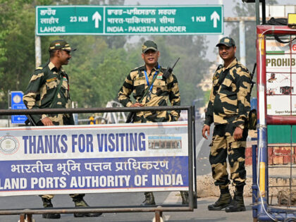 Indian Border Security Force (BSF) soldiers stand guard near the India-Pakistan Wagah bord