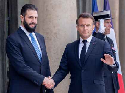 Emmanuel Macron, France's president, right, welcomes Ahmed Al-Sharaa, Syria's pr