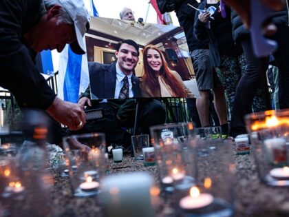 Maher - WASHINGTON, D.C. - MAY 22: People gather outside the White House for a candlelight